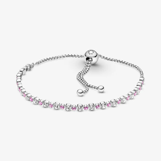 Rhodium plated sterling silver slider bracelet with clear cubic zirconia and synthetic pink sapphire